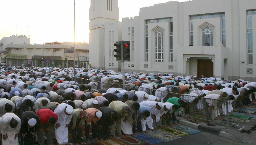 Muslims offer the early morning prayers to celebrate the festival of Eid al-Adha in Doha, capital of Qatar, on Nov. 6, 2011.