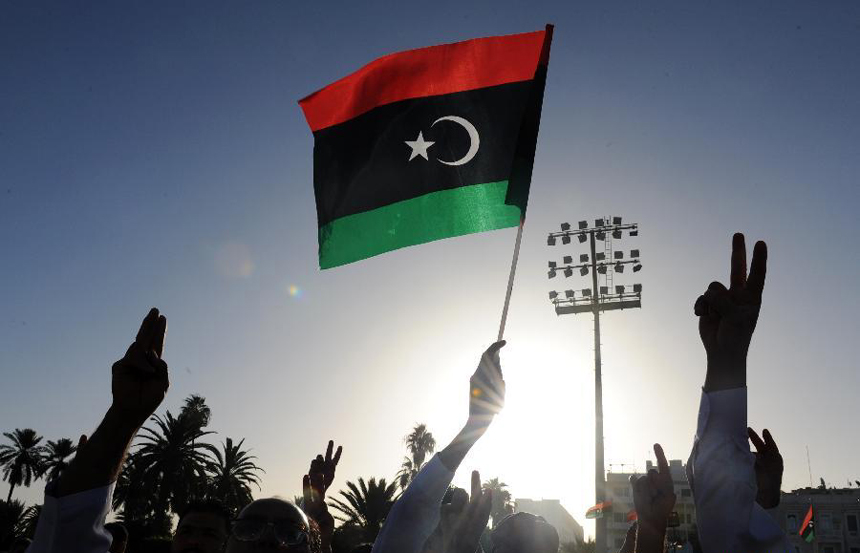 Libyans celebrate Eid al-Adha festival at the Martyrs' Square in Tripoli, Libya, Nov. 6, 2011.