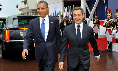 Careless talk... Presidents Barack Obama and Nicolas Sarkozy. [Agencies]