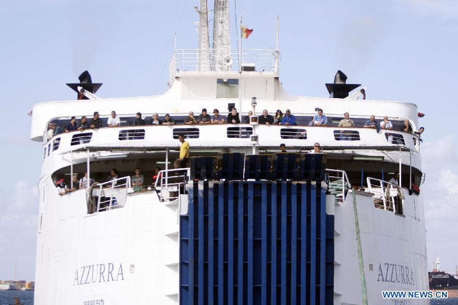 A liner carrying passengers from Malta arrives at a harbor in Tripoli, Libya, Nov. 10, 2011. The passenger liner has been resumed between Libya and Malta. [Hamza Turkia/Xinhua]