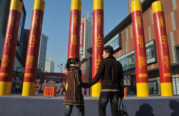 Six three-meter-tall pillars put up in front of a shopping mall in Shenyang, capital of Liaoning province, to symbolically represent the rare date, 11.11.11. The pillars were set up to mark Singles' Day, which falls on Nov 11. [Photo/ China Daily ] 