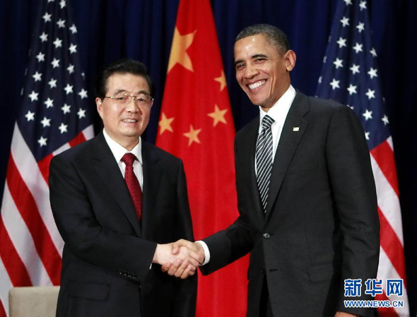 Chinese President Hu Jintao meets with U.S. President Barack Obama in Honolulu, Hawaii, Saturday to discuss Sino-U.S. ties and major world and regional issues.