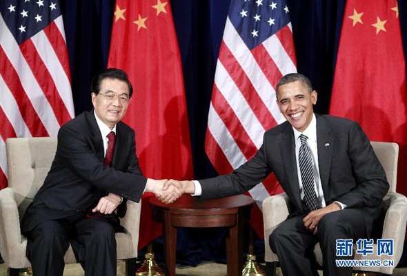 Chinese President Hu Jintao meets with U.S. President Barack Obama in Honolulu, Hawaii, Saturday to discuss Sino-U.S. ties and major world and regional issues.