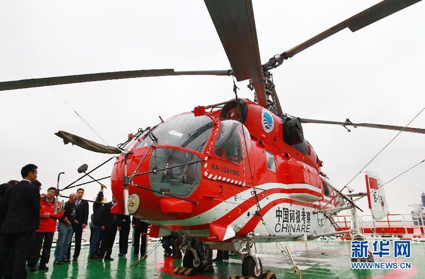 A helicopter lands on the Chinese icebreaker Xue Long, or 'Snow Dragon', on October 29, 2011. 