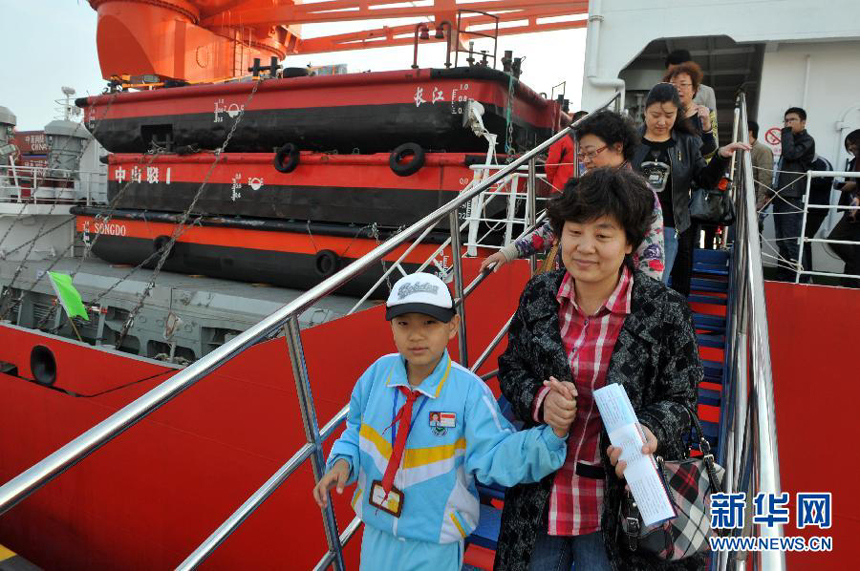 Local residents visit the Chinese icebreaker Xue Long, or 'Snow Dragon', is anchored offshore of the northern port city of Tianjin on Nov. 1, 2011.