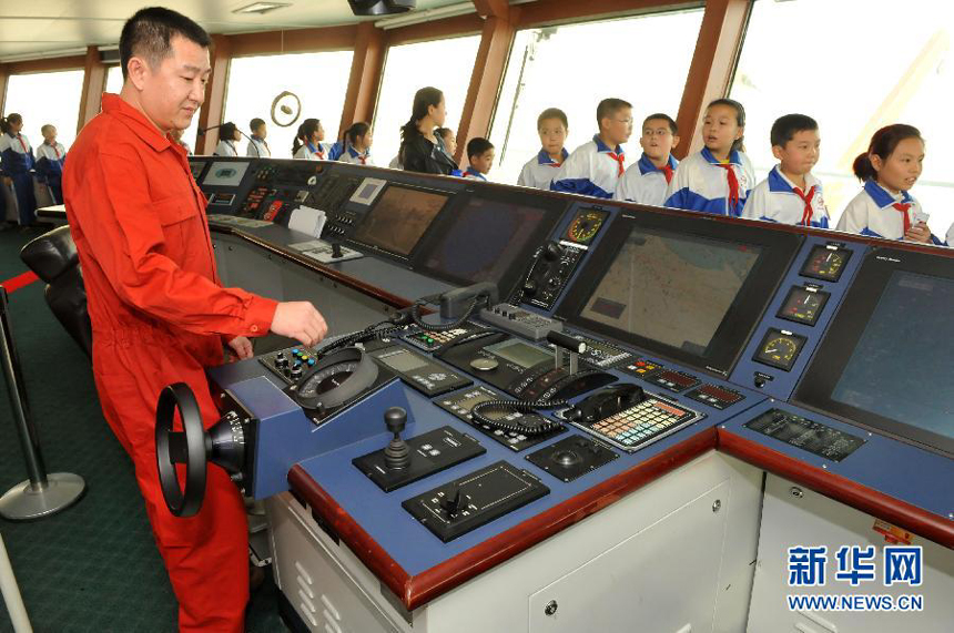 Students visit the Chinese icebreaker Xue Long, or 'Snow Dragon', is anchored offshore of the northern port city of Tianjin on Nov. 1, 2011. 