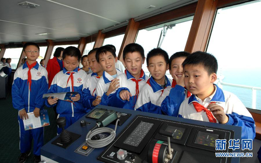 Students visit the Chinese icebreaker Xue Long, or 'Snow Dragon', is anchored offshore of the northern port city of Tianjin on Nov. 1, 2011. 