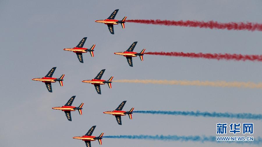 Planes perform during the Dubai International Airshow which kicked off on November 13, 2011. 