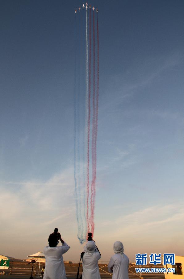 Planes perform during the Dubai International Airshow which kicked off on November 13, 2011. 