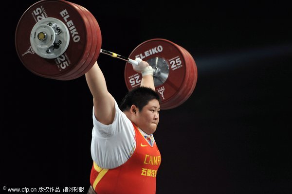 Lulu Zhou from China competes in the women's +75kg snatch and lift competition, she scores a world record on the total with 328kg, at the World Weightlifting Championships in Disney Village near Paris, France 13 November 2011. 