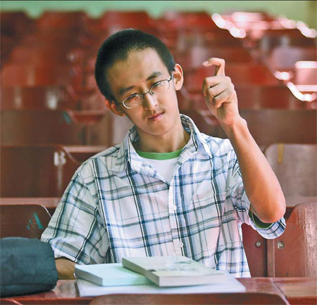 Zhang Xinyang, 16, says he usually gets up at 9 am to begin his day's college work at 10. He is pursuing a doctorate in mathematics at Beihang University in Beijing. [Photo / China Daily]