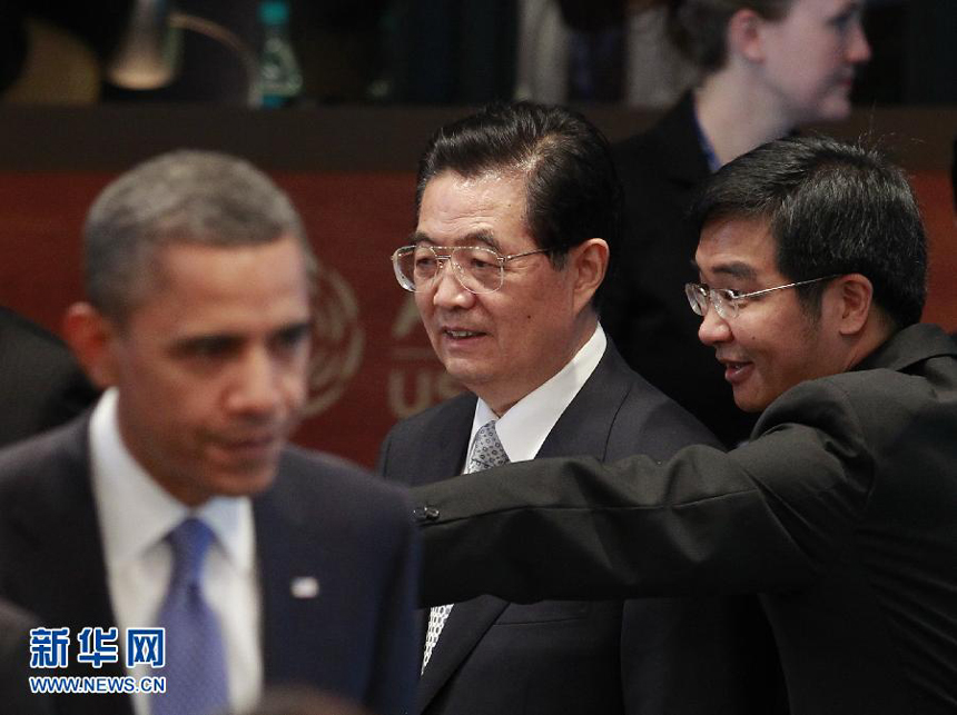 Chinese President Hu Jintao attends the first session of the Asia-Pacific Economic Cooperation (APEC) 19th informal leadership meeting in Honolulu, Hawaii, the United States, Nov. 13, 2011. 