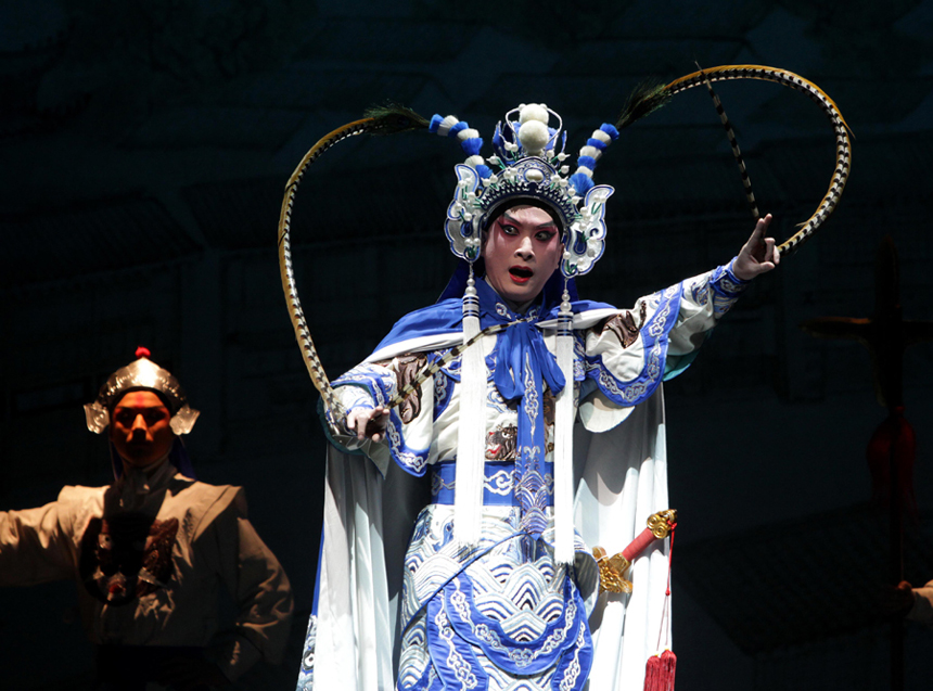 Photo taken on Nov. 13, 2011 shows a scene of the Peking Opera 'Notre Dame' at the Luojiashan Theater in Wuhan, capital of central China's Hubei Province.