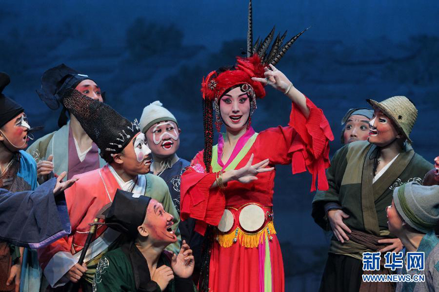 Photo taken on Nov. 13, 2011 shows a scene of the Peking Opera 'Notre Dame' at the Luojiashan Theater in Wuhan, capital of central China's Hubei Province. 