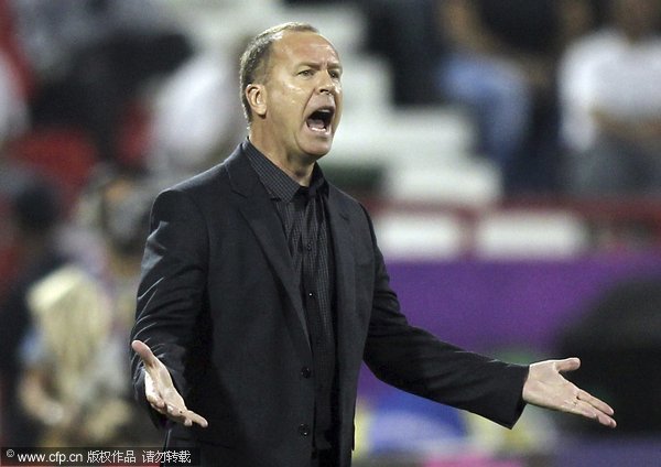  Brazil's soccer team coach Mano Menezes gestures during their international friendly match in Doha, Qatar on Monday Nov. 14, 2011.