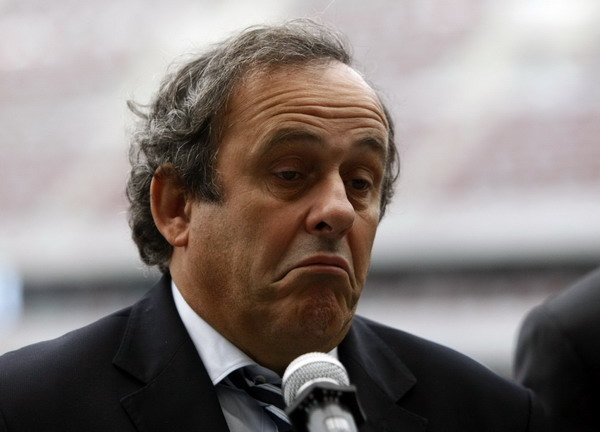 Platini takes a dig at Blatter over extra linesmen