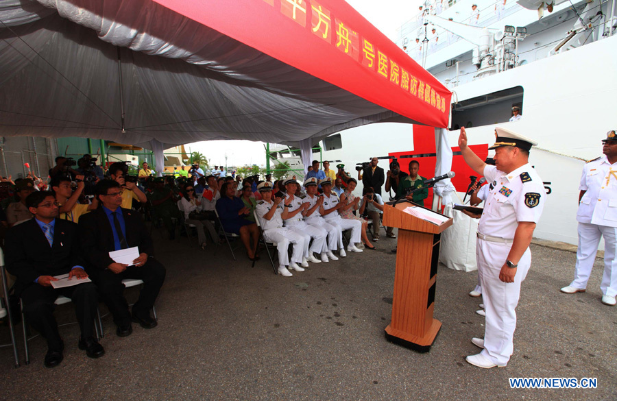 National denfense army of Trinidad and Tobago hold a send-off ceremony before soldiers from the Chinese Navy &apos;Peace Ark&apos; hospital ship depart from Port of Spain, Trinidad and Tobago, Nov. 15, 2011. The Chinese Navy &apos;Peace Ark&apos; hospital ship is heading for Costa Rica to continue the humanitarian medical services after concluding its seven-day mission in Trinidad and Tobago. [Zha Chunming/Xinhua]