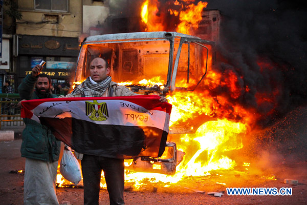 Protestors shout slogans in Tahrir Square of Egyptian capital Cairo on Nov. 19, 2011. 