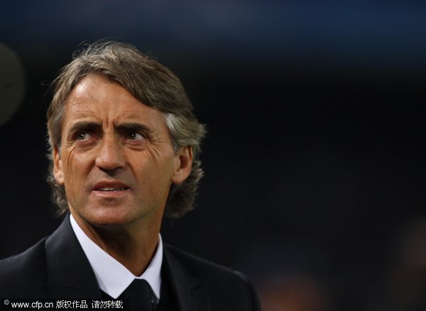 Roberto Mancini the coach of Manchester City looks on during the UEFA Champions League Group A match between SSC Napoli and Manchester City FC at Stadio San Paolo on November 22, 2011 in Naples, Italy. 