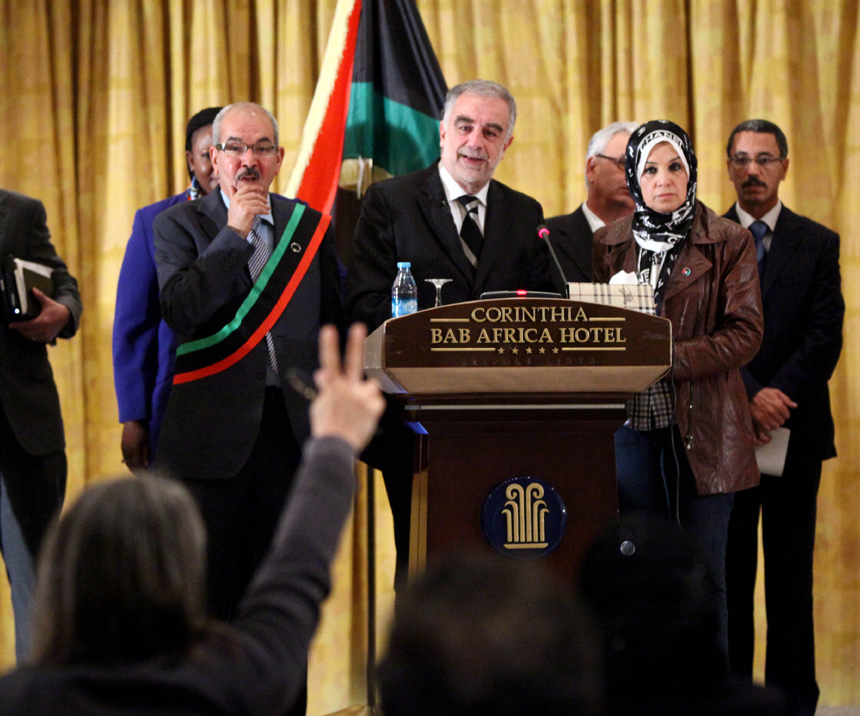 Luis Moreno-Ocampo (4th R), the Chief Prosecutor of the International Criminal Court (ICC), speaks during a joint press conference after meeting with Libya's Interim Justice Minister Mohammed al-Allagui in Tripoli, capital of Libya, on Nov. 23, 2011. Luis Moreno-Ocampo said here Wednesday that Saif al-Islam, the captured son of slain Libyan leader Muammar Gaddafi, will be tried inside Libya. 