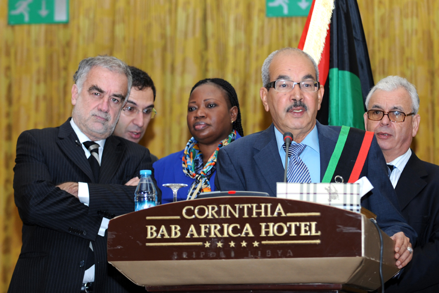 Luis Moreno-Ocampo (1st L), the Chief Prosecutor of the International Criminal Court (ICC), attends a joint press conference after meeting with Libya's Interim Justice Minister Mohammed al-Allagui in Tripoli, capital of Libya, on Nov. 23, 2011. Luis Moreno-Ocampo said here Wednesday that Saif al-Islam, the captured son of slain Libyan leader Muammar Gaddafi, will be tried inside Libya. 