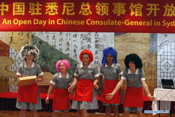 Students from Abbotsleigh Girl School of Sydney perform a Chinese rap show 'Mum is cooking' during the Open Day event organized by Chinese Consulate-General in Sydney, Australia, on Nov. 23, 2011. 