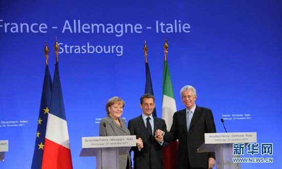 German Chancellor Angela Merkel, left, France&apos;s President Nicolas Sarkozy, center, and Italy&apos;s Prime Minister Mario Monti, right, during a press conference in Strasbourg, eastern France, Thursday, Nov 24, 2011. The leaders of Germany, France and Italy are set for debate on the European Central Bank&apos;s role in the region&apos;s debt crisis and on how to align eurozone economic policies.