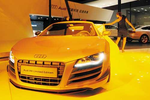 The 9th Guangzhou Auto Show opened in Guangzhou, south China, on Nov. 24, 2011. Themed as 'Green Techonology and Harmonious Future', the 9th Guangzhou International Automobile Exhibition displayed 900 automobiles, including 30 world premiered cars and 54 new energy vehicles. [Chen Yehua/Xinhua]