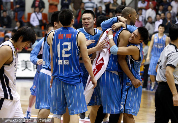  Players of Beijing Ducks celebrate victory over Dongguan Marco Polo.