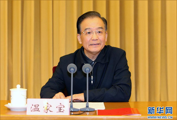 Premier Wen Jiabao speaks at the opening ceremony of the fifth national meeting on women and children affairs in Beijing on November 27, 2011. 