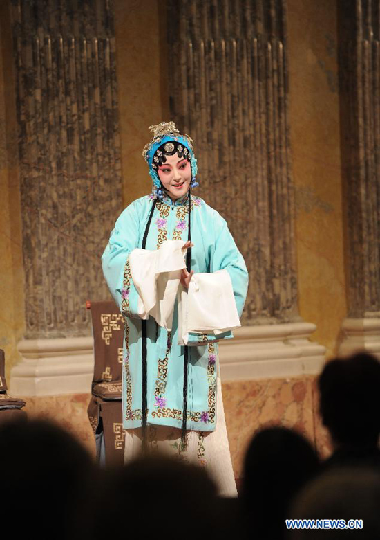 An artist of the Chinese Northern Kunqu Opera Theater performs in the classic piece of Kunqu Opera 'Dou E Yuan' at the Austrian Academy of Sciences in Vienna, capital of Austria, Nov. 24, 2011.