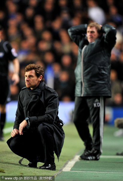 Opposing Managers Andre Villas-Boas (L) the Chelsea manager and Kenny Dalglish (R) the Liverpool manager react during the Carling Cup quarter final match between Chelsea and Liverpool at Stamford Bridge on November 29, 2011 in London, England. 