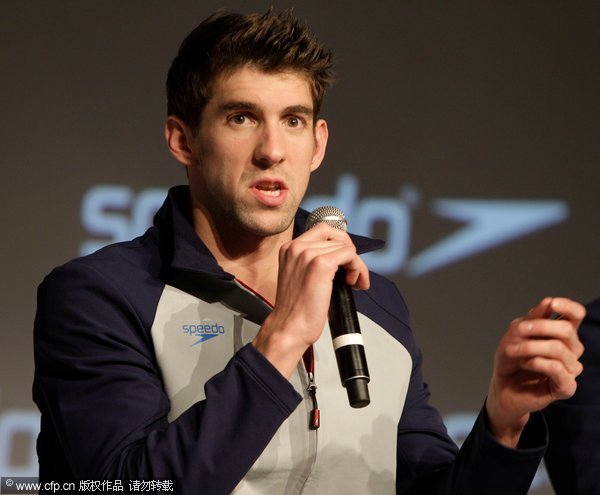  Sixteen-time Olympic medalist Michael Phelps gestures as he speaks during a press conference debuting Speedo's new fastskin 3 swimsuit in New York on Nov. 30, 2011.