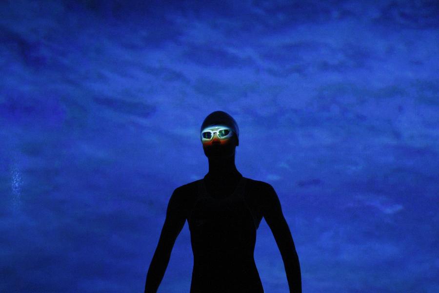 A model presents a pair of goggles from the new Speedo brand swimsuits 'Speedo FASTSKIN3' for the U.S. Olympic team during a news conference in New York November 30, 2011. (Xinhua/Reuters Photo)