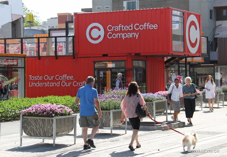 Local residents visit a Shopping Mall built with pop-up shipping containers in central Christchurch, New Zealand, on Dec. 3, 2011. Twenty-seven shops and cafes have been built from 64 converted shipping containers in the mall, which became the first part of the city's red zone to open for business since the Feb. 22 quake which killed 181 people. Built out of shipping containers, the precinct is home to more than 20 shops and represents a new beginning for Christchurch's quake-ravaged CBD.