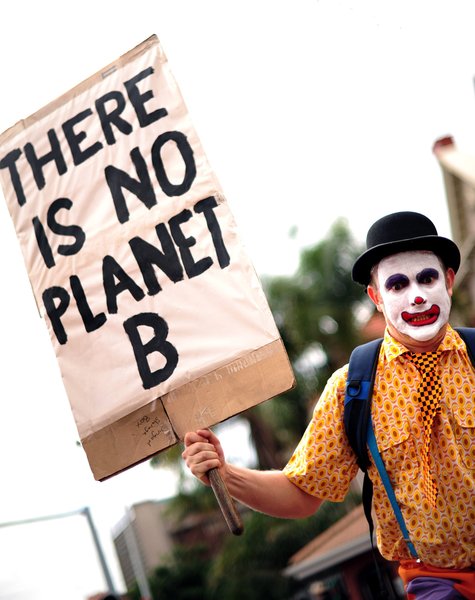 A handout photograph provided by Greenpeace shows some of the thousands of people marching to the ICC during the mass protest in Durban, South Africa, December 3, 2011. The protest is part of the 17th Conference of Parties of the United Nations Framework Convention on Climate Change (COP 17) which continues this week. [CFP]