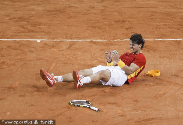 Rafael Nadal reacts after beating Argentina's Juan Martin del Potro 1-6, 6-4, 6-1, 7-6(0) and win the Davis Cup for Spain 3-1 in Sevilla on Sunday.