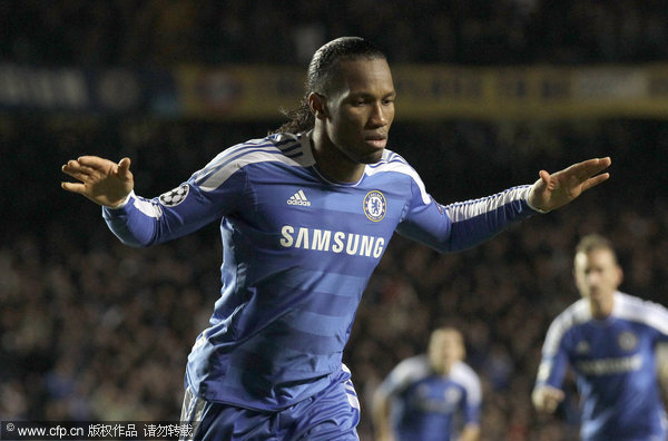 Chelsea's Didier Drogba celebrates scoring a goal against Valencia during their Champions League Group E match at Stamford Bridge stadium in London on Tuesday, Dec. 6, 2011.