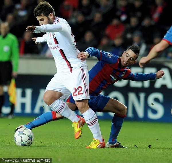  Antonio Nocerino (L) of AC Milan vies for the ball with Milan Petrzela (R) of Viktoria Plzen during their UEFA Champions League group H soccer match at Synot Tip Arena, in Prague, Czech Republic, on December 6, 2011.