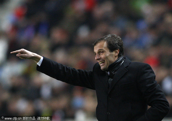  Massimiliano Allegri head coach of AC Milan instructs his players during the Champions League Group H soccer match against Plzen in Prague, Czech Republic on Tuesday, Dec. 6, 2011.