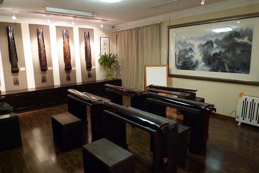 Seven-string zithers are on display in Duyi Zither Club in Beijing from November 20 to December 20, 2011. [Photo by Xu Lin / China.org.cn]