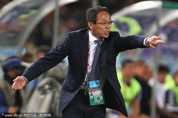 Takeshi Okada, head coach of Japan directs his team during the 2010 FIFA World Cup South Africa Round of Sixteen match between Paraguay and Japan at Loftus Versfeld Stadium on June 29, 2010 in Pretoria, South Africa.