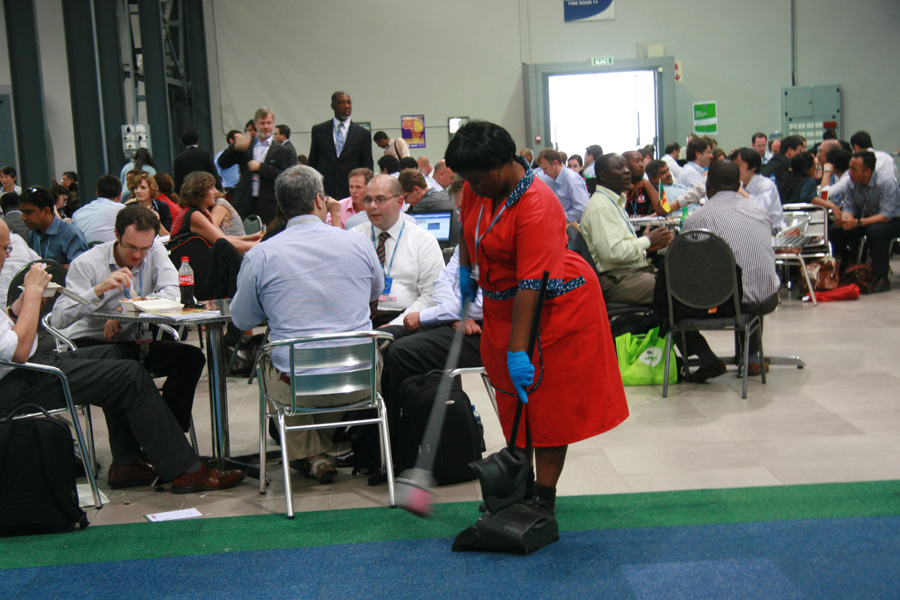 There is a special group of people at the on-going UN Climate Change Conference in Durban, South Africa. They are easily neglected by People. But what they do is quite important. They are the cleaners in the arenas.[Unisumoon/China.org.cn] 