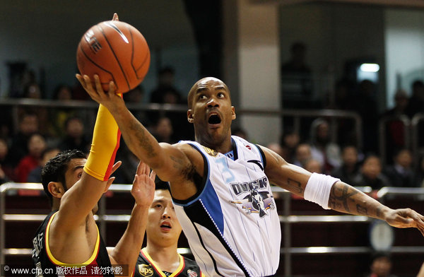  Stephen Marbury lays up in a CBA game.