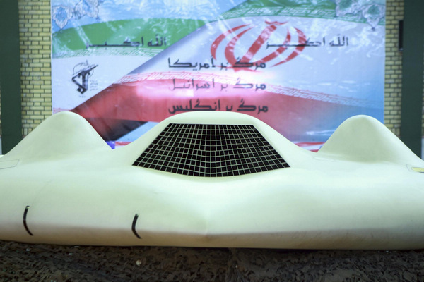 US drone shot down by Iran unveiled on TV