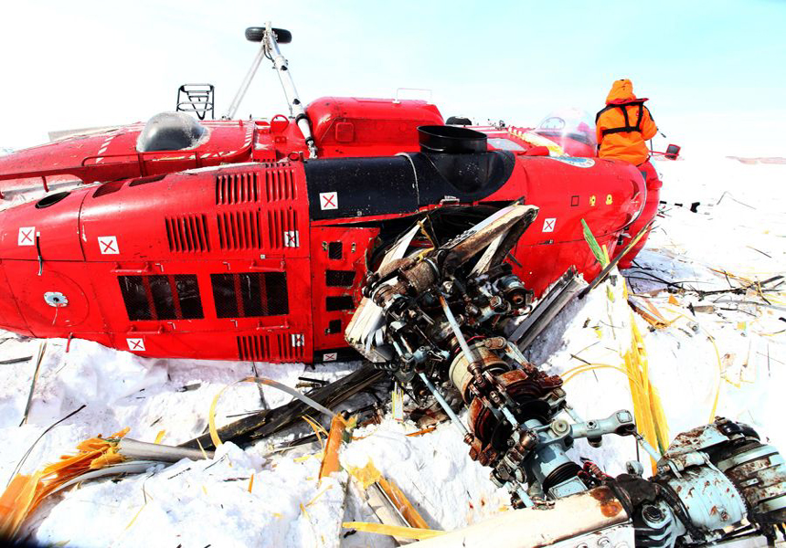 The Xueying helicopter lies heavily damaged after crashing in Antarctica in the small hours of Friday Beijing time. The two crew members were safely returned to their supporting icebreaker.