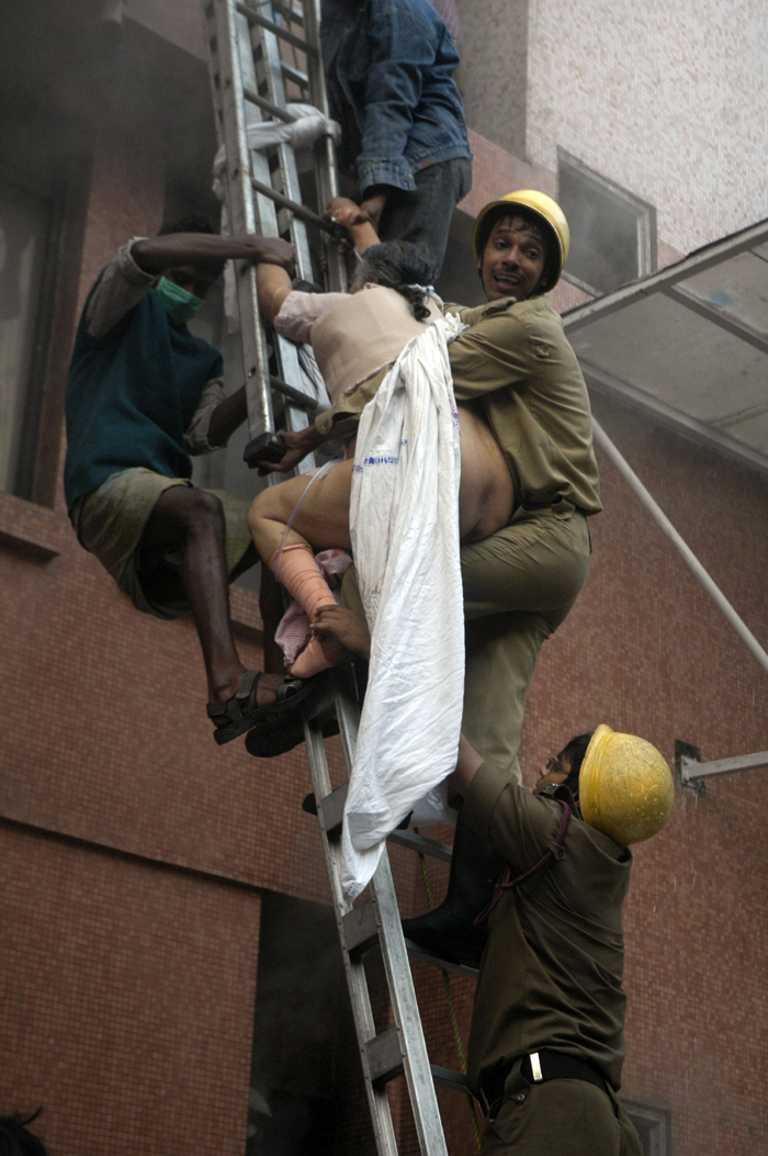 A fire tore through a seven-storey private hospital in the eastern Indian city of Kolkata before dawn on Friday, killing at least 89 people, most of them intensive care patients who were asleep and suffocated in the fumes.