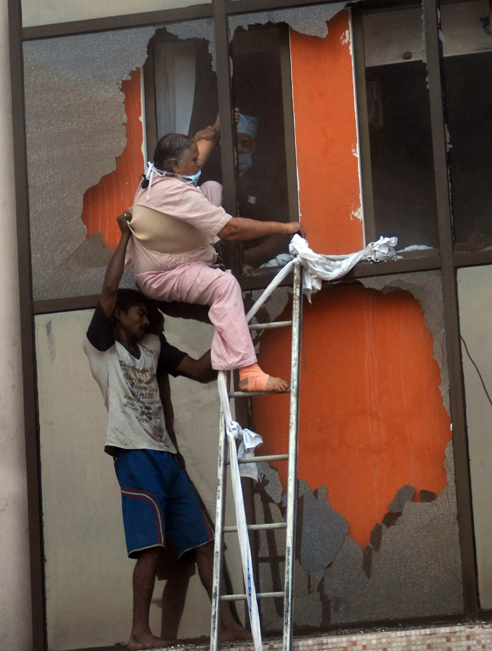 A fire tore through a seven-storey private hospital in the eastern Indian city of Kolkata before dawn on Friday, killing at least 89 people, most of them intensive care patients who were asleep and suffocated in the fumes.