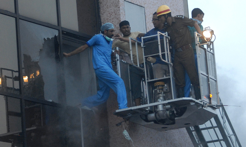 A fire tore through a seven-storey private hospital in the eastern Indian city of Kolkata before dawn on Friday, killing at least 89 people, most of them intensive care patients who were asleep and suffocated in the fumes.