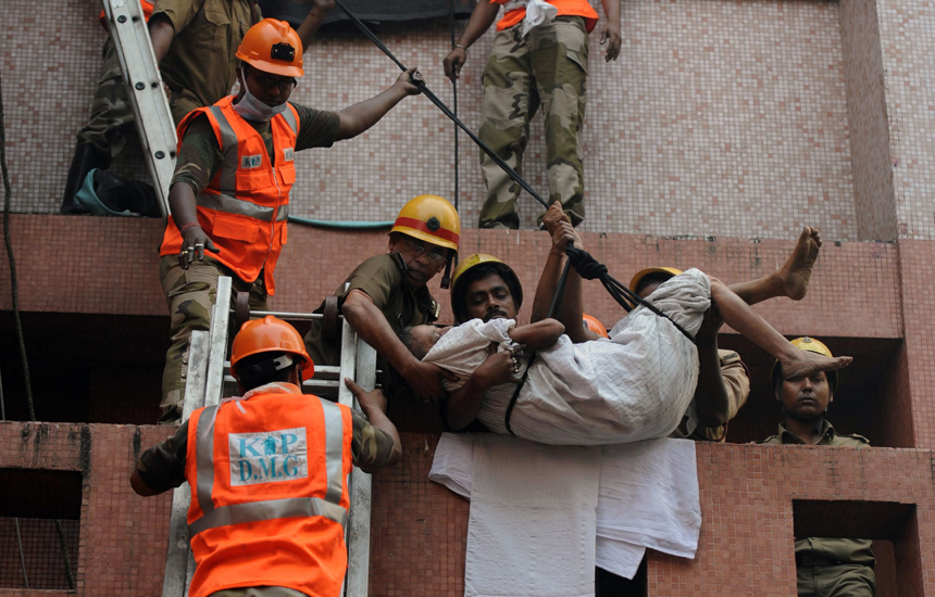 A fire tore through a seven-storey private hospital in the eastern Indian city of Kolkata before dawn on Friday, killing at least 89 people, most of them intensive care patients who were asleep and suffocated in the fumes.